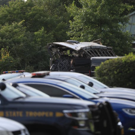 The damaged coach bus which crashed on Thursday killing 2 passengers in the back parking lot of the New York State Police Troop F barracks on Friday Sept. 22, 2023.