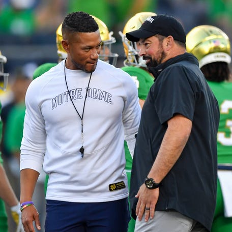 Sep 23, 2023; South Bend, Indiana, USA; Notre Dame Fighting Irish head coach Marcus Freeman and Ohio State Buckeyes head coach Ryan Day chat before the game at Notre Dame Stadium. Mandatory Credit: Matt Cashore-USA TODAY Sports