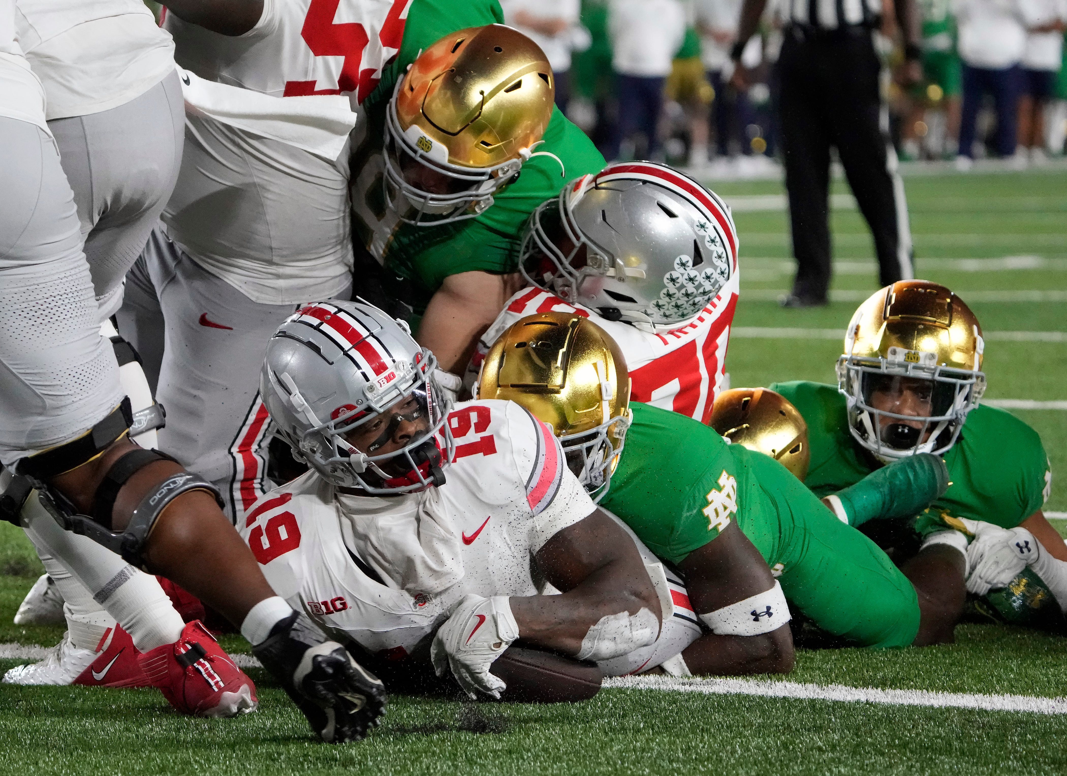 Ohio State running back Chip Trayanum (19) scores the game winning touchdown against Notre Dame.