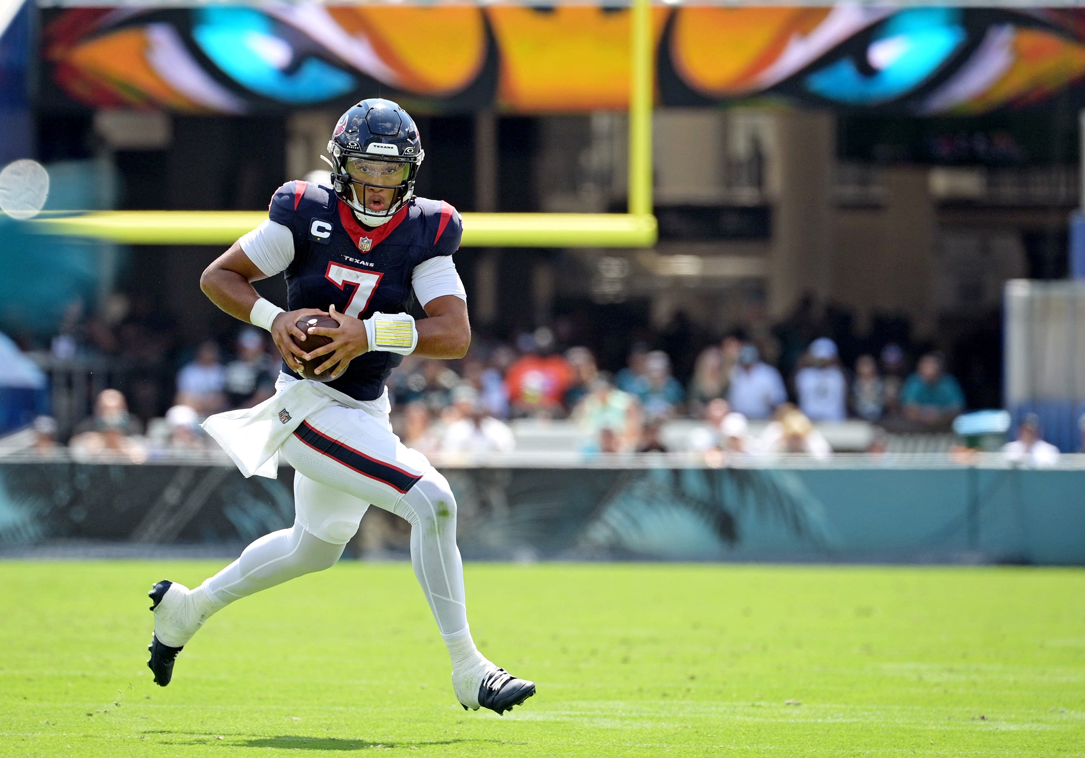 Houston Texans quarterback CJ Stroud (7) looks to pass during the first half against the Jacksonville Jaguars at EverBank Stadium.