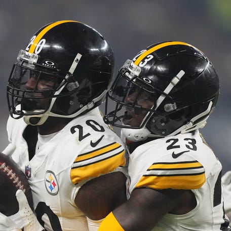 Pittsburgh Steelers cornerback Patrick Peterson (20) celebrates with safety Damontae Kazee (23) after intercepting a pass against the Las Vegas Raiders at Allegiant Stadium.