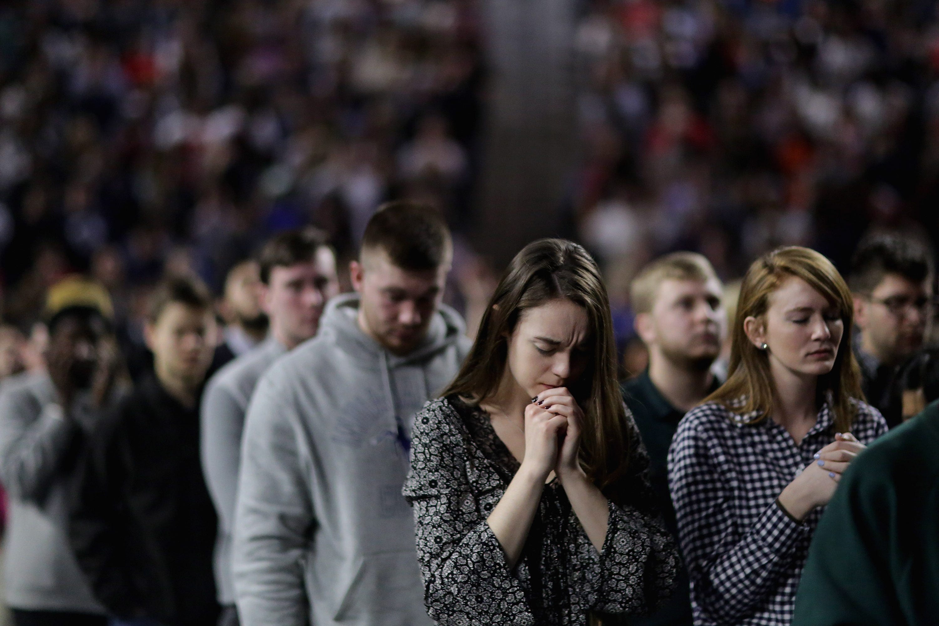 LYNCHBURG, VA - JANUARY 18: Thousands of students, supporters and invited guests bow their heads in prayer before Republican presidential candidate Donald Trump delivers the convocation in the Vines Center on the campus of Liberty University January 18, 2016 in Lynchburg, Virginia. A billionaire real estate mogul and reality television personality, Trump addressed students and guests at the non-profit, private Christian university that was founded in 1971 by   evangelical Southern Baptist televangelist Jerry Falwell. (Photo by Chip Somodevilla/Getty Images)