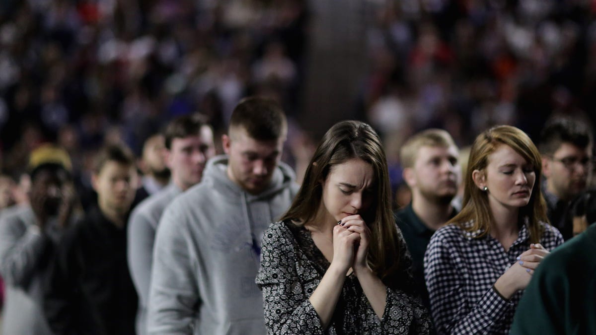 LYNCHBURG, VA - JANUARY 18: Thousands of students, supporters and invited guests bow their heads in prayer before Republican presidential candidate Donald Trump delivers the convocation in the Vines Center on the campus of Liberty University January 18, 2016 in Lynchburg, Virginia. A billionaire real estate mogul and reality television personality, Trump addressed students and guests at the non-profit, private Christian university that was founded in 1971 by   evangelical Southern Baptist televangelist Jerry Falwell. (Photo by Chip Somodevilla/Getty Images)