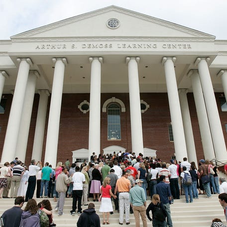 LYNCHBURG, VA - MAY 17: Mourners wait to get into Arthur S. DeMoss Learning Center of Liberty University to pay respects to the late Rev. Jerry Falwell at a viewing May 17, 2007 in Lynchburg, Virginia. Falwell, founder of Thomas Road Baptist Church and Liberty University, died at the age of 73. The funeral service for Falwell is scheduled on May 22 at Thomas Road Baptist Church. (Photo by Alex Wong/Getty Images)