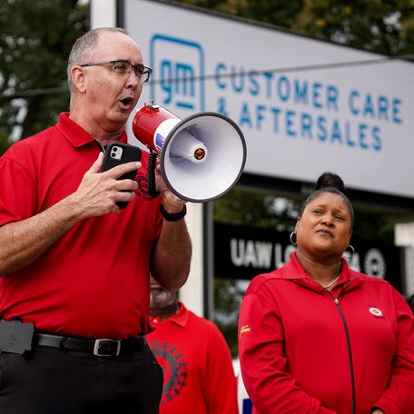 UAW President Shawn Fain speaks to workers picketing at General Motors Willow Run Redistribution in Belleville on Tuesday, September 26, 2023, during a stop to Michigan by President Joe Biden.