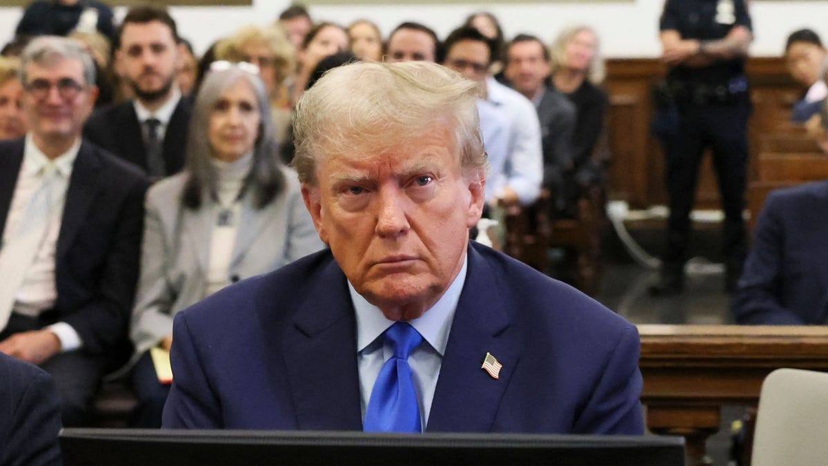 Former President Donald Trump sits with his attorneys inside the courtroom during civil fraud case brought by state Attorney General Letitia James, at a Manhattan courthouse, in New York City, on Oct. 2, 2023. Trump was in court Monday for a civil fraud trial against him and two of his sons, with the case threatening the Republican's business empire as he campaigns to retake the White House.