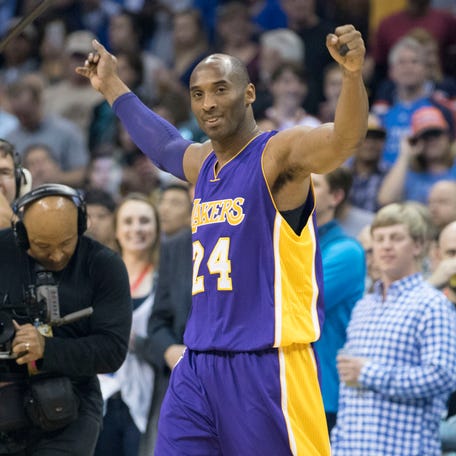 OKLAHOMA CITY, OK - APRIL 11: Kobe Bryant #24 of the Los Angeles Lakers greets fans before the first quarter of a NBA game against the Oklahoma City Thunder during his last road game at the Chesapeake Energy Arena on April 22, 2016 in Oklahoma City, Oklahoma. NOTE TO USER: User expressly acknowledges and agrees that, by downloading and or using this photograph, User is consenting to the terms and conditions of the Getty Images License Agreement. (Photo by J Pat   Carter/Getty Images)