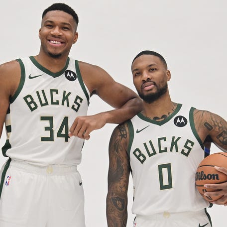 The Bucks believe Damian Lillard (right) will help them to another NBA title and keep Giannis Antetokounmpo (left) happy in Milwaukee.
