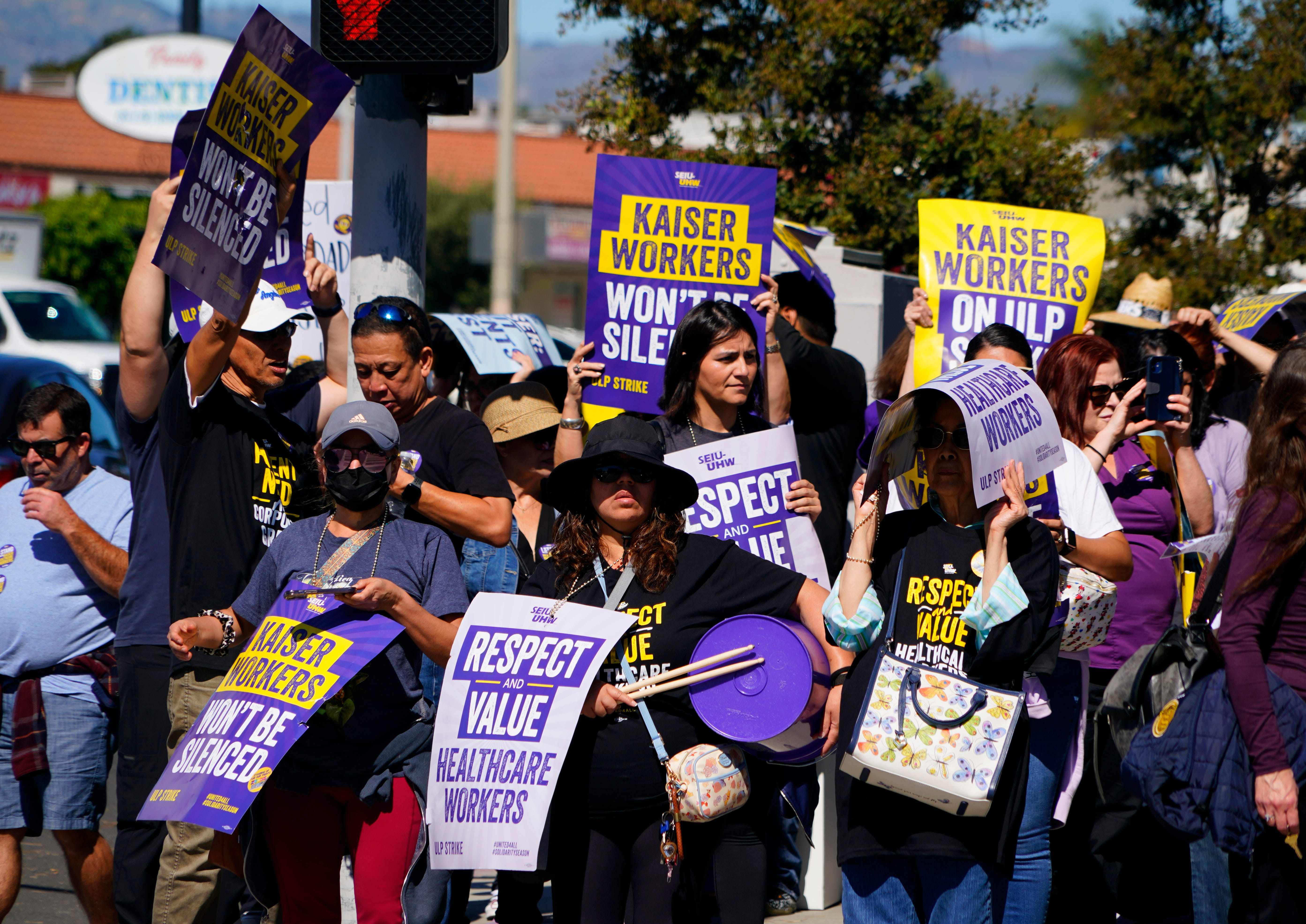 Striking health care workers picket in front of Kaiser Permanente Medical Center in Panorama City, Calif. on Wednesday, Oct. 4, 2023.
