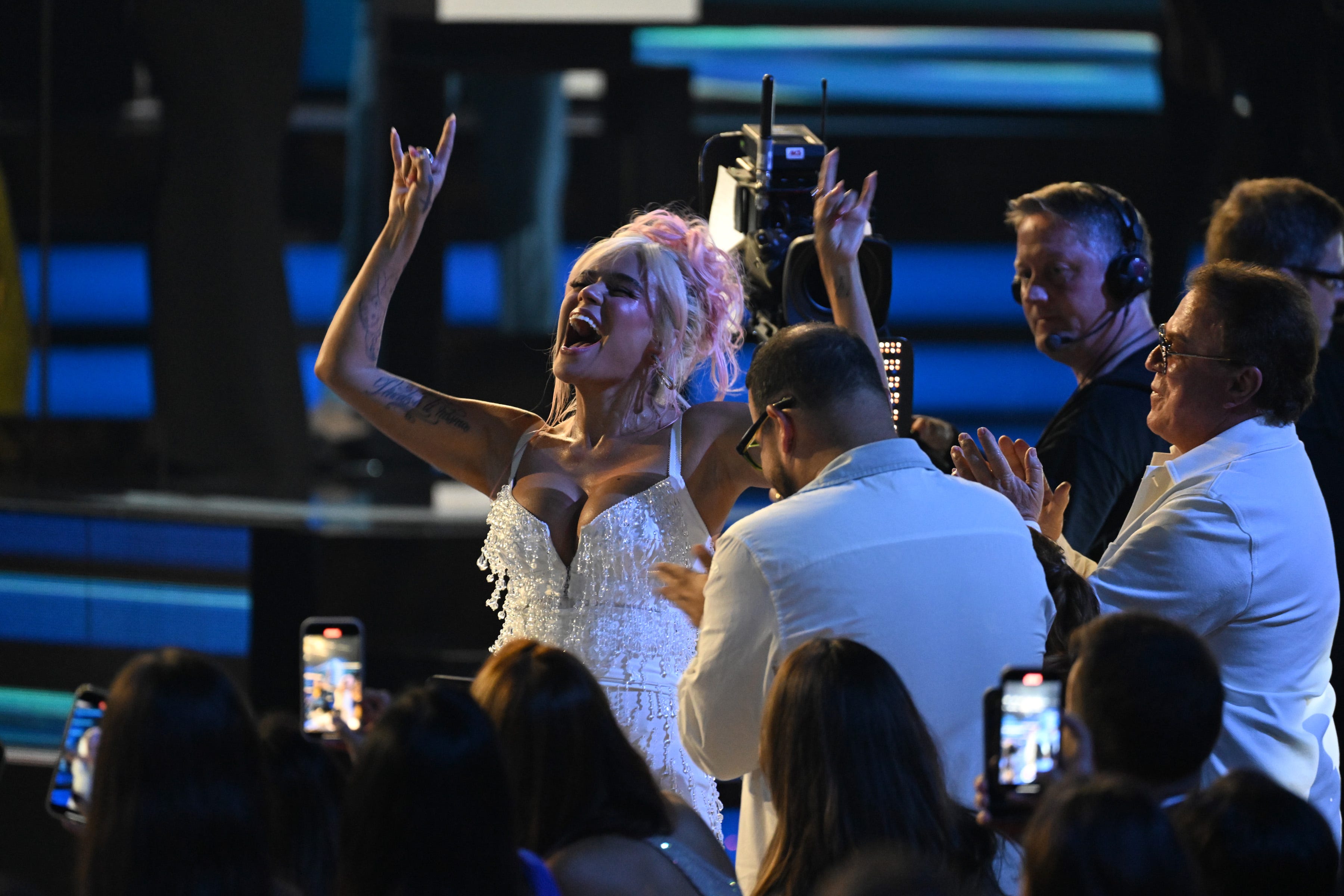Singer Karol G reacts to winning the Top Latin Album of the Year.