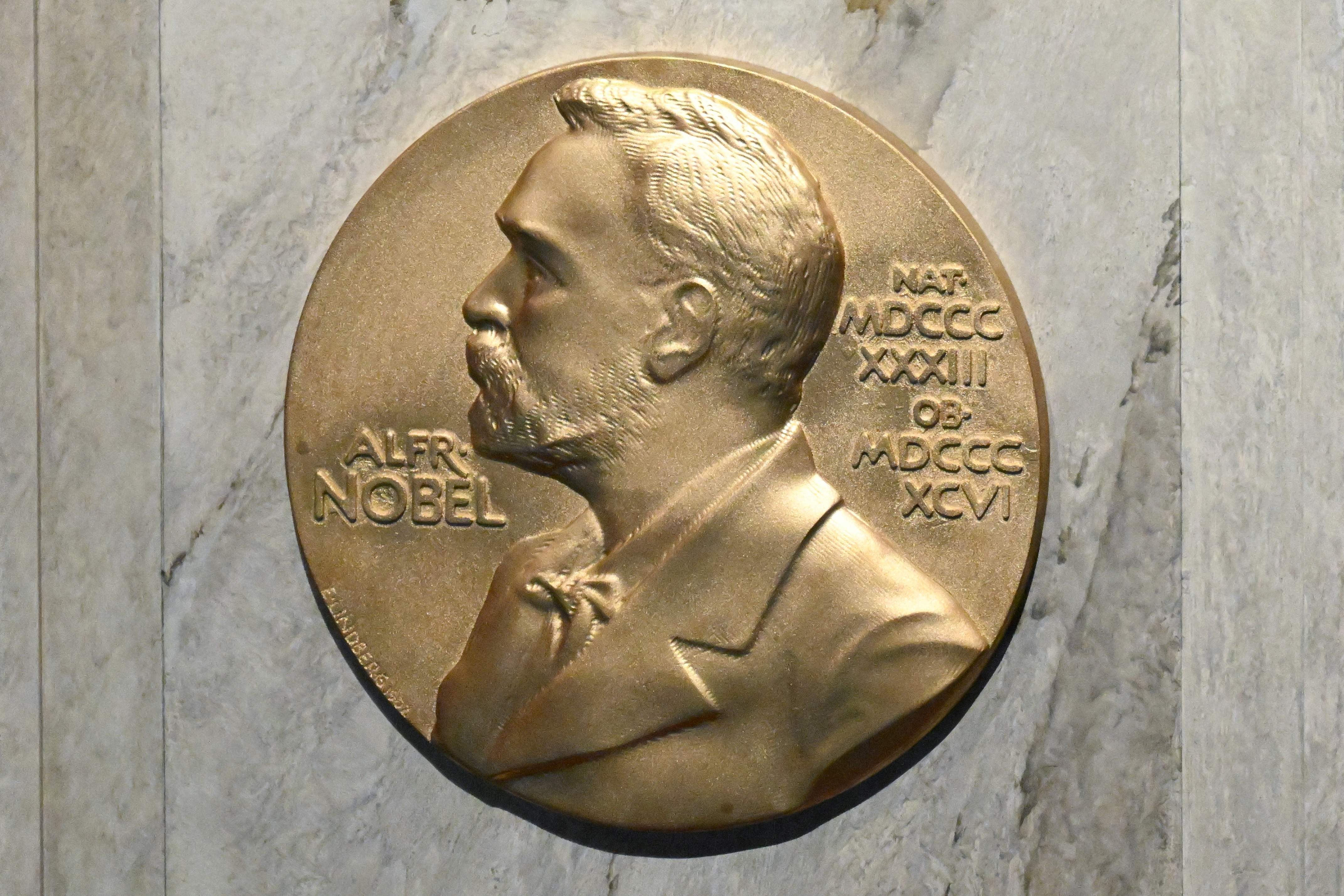 This file photo taken on Dec. 10, 2022 shows a plaque with Alfred Nobel, a Swedish inventor who bequeathed his fortune to establish the Nobel Prize.