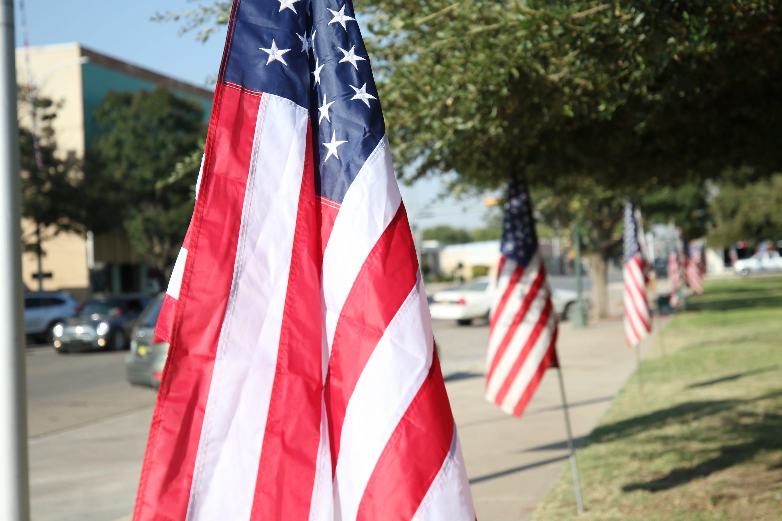 American flags are displayed in celebration of Columbus Day, Oct. 8, 2020 in downtown Carlsbad.