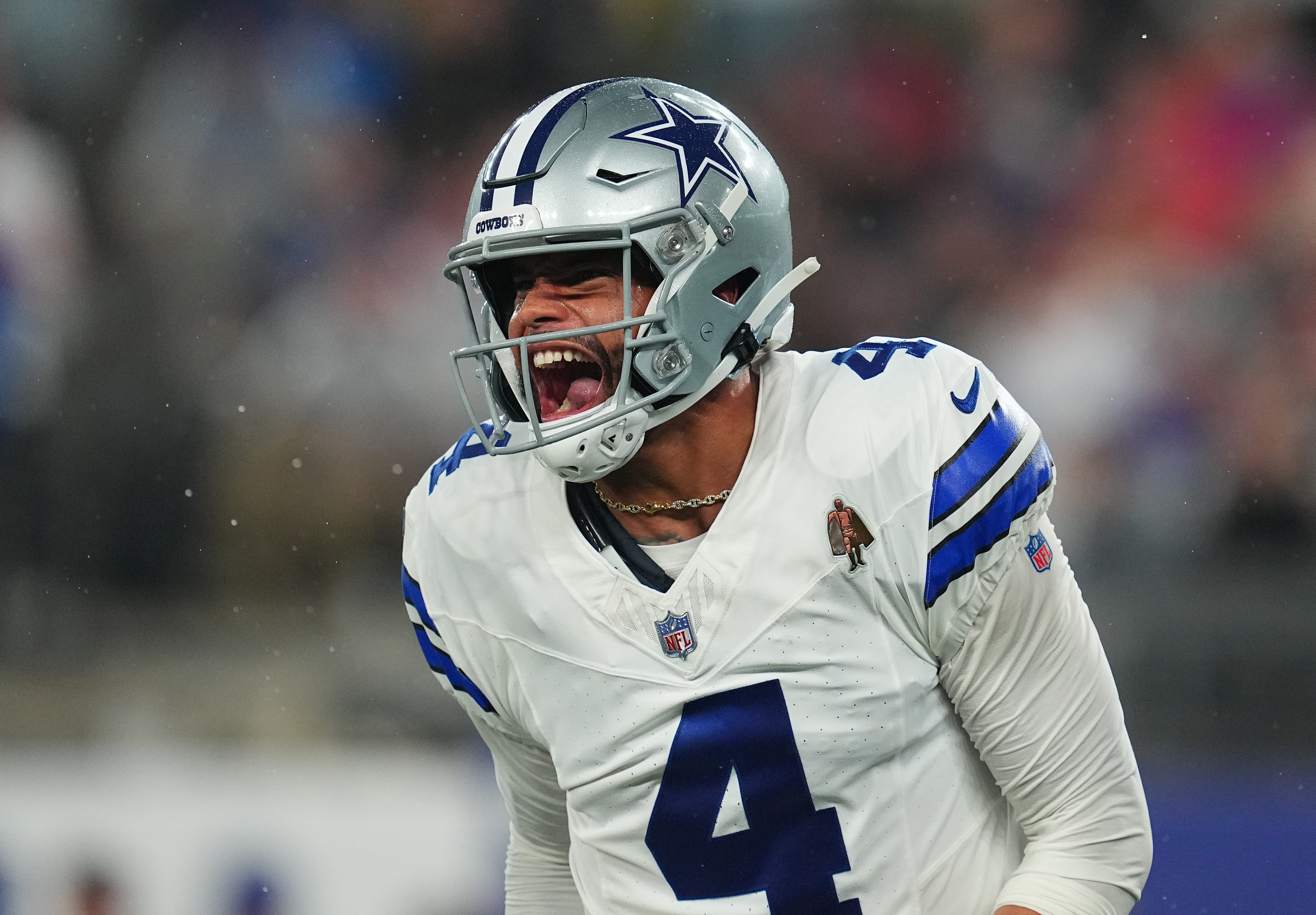 EAST RUTHERFORD, NEW JERSEY - SEPTEMBER 10: Dak Prescott #4 of the Dallas Cowboys reacts after a touchdown run by KaVontae Turpin #9 during the fourth quarter against the New York Giants at MetLife Stadium on September 10, 2023 in East Rutherford, New Jersey. (Photo by Mitchell Leff/Getty Images) ORG XMIT: 775992261 ORIG FILE ID: 1673065794
