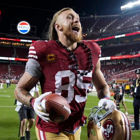 San Francisco 49ers tight end George Kittle (85) celebrates after the 49ers defeated the Dallas Cowboys in an NFL football game in Santa Clara, Calif., Sunday, Oct. 8, 2023. (AP Photo/Godofredo A. Vásquez) ORG XMIT: FXN156