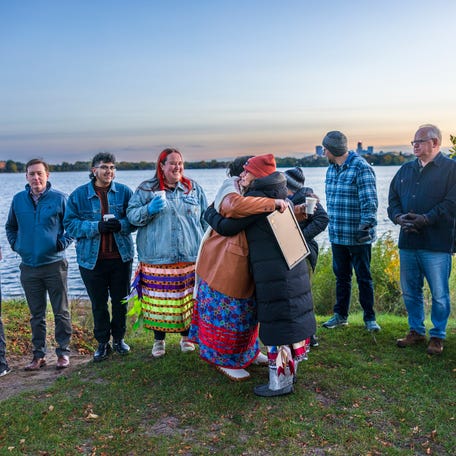 People attend an Indigenous Peoples Day Sunrise Ceremony at Bde Maka Ska in Minneapolis, Minn. on Monday, Oct. 9, 2023.