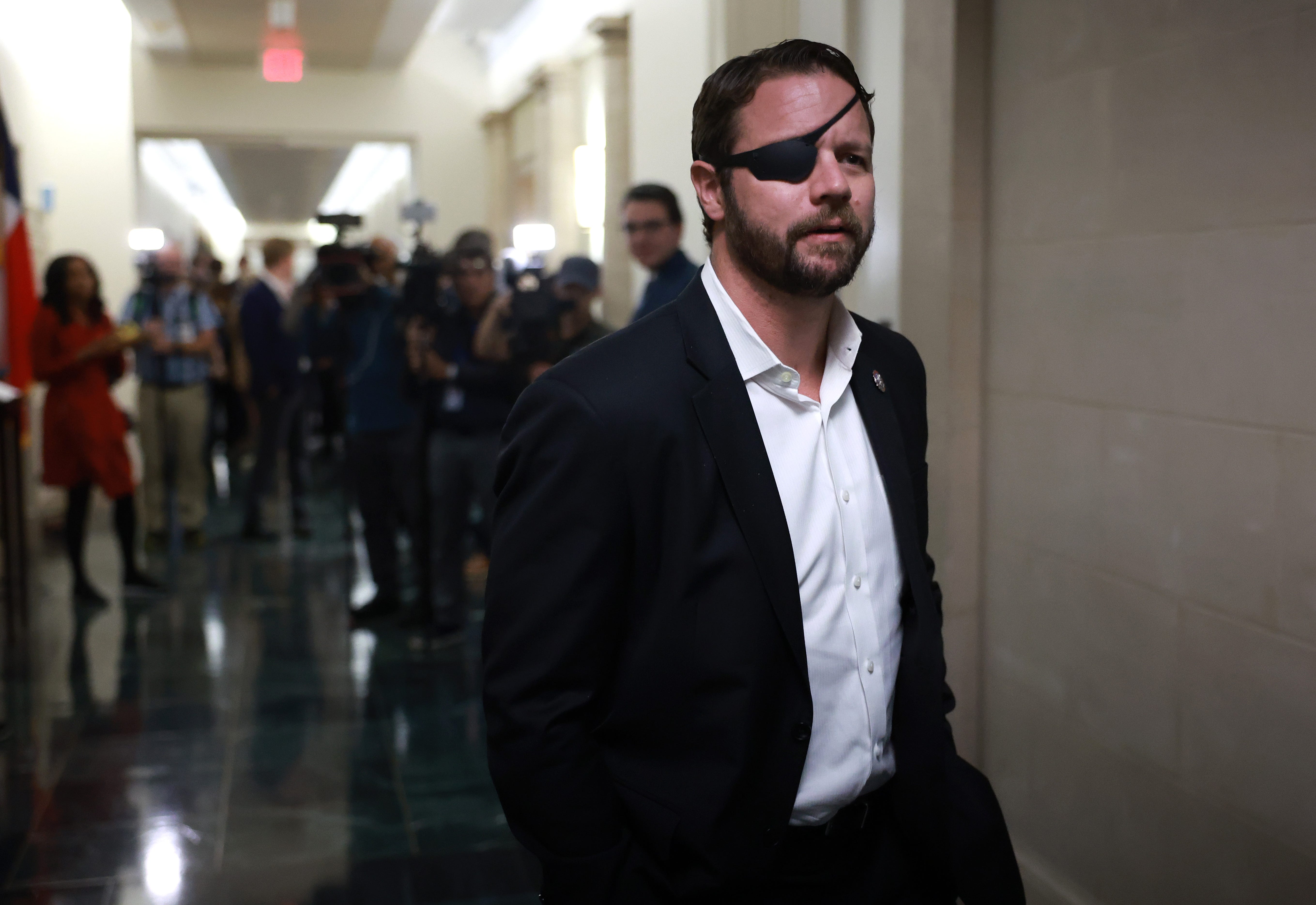 U.S. Rep. Dan Crenshaw, R-Texas, leaves a candidate forum with House Republicans to hear from members running for U.S. Speaker of House in the Longworth House Office Building on October 10, 2023 in Washington, DC.