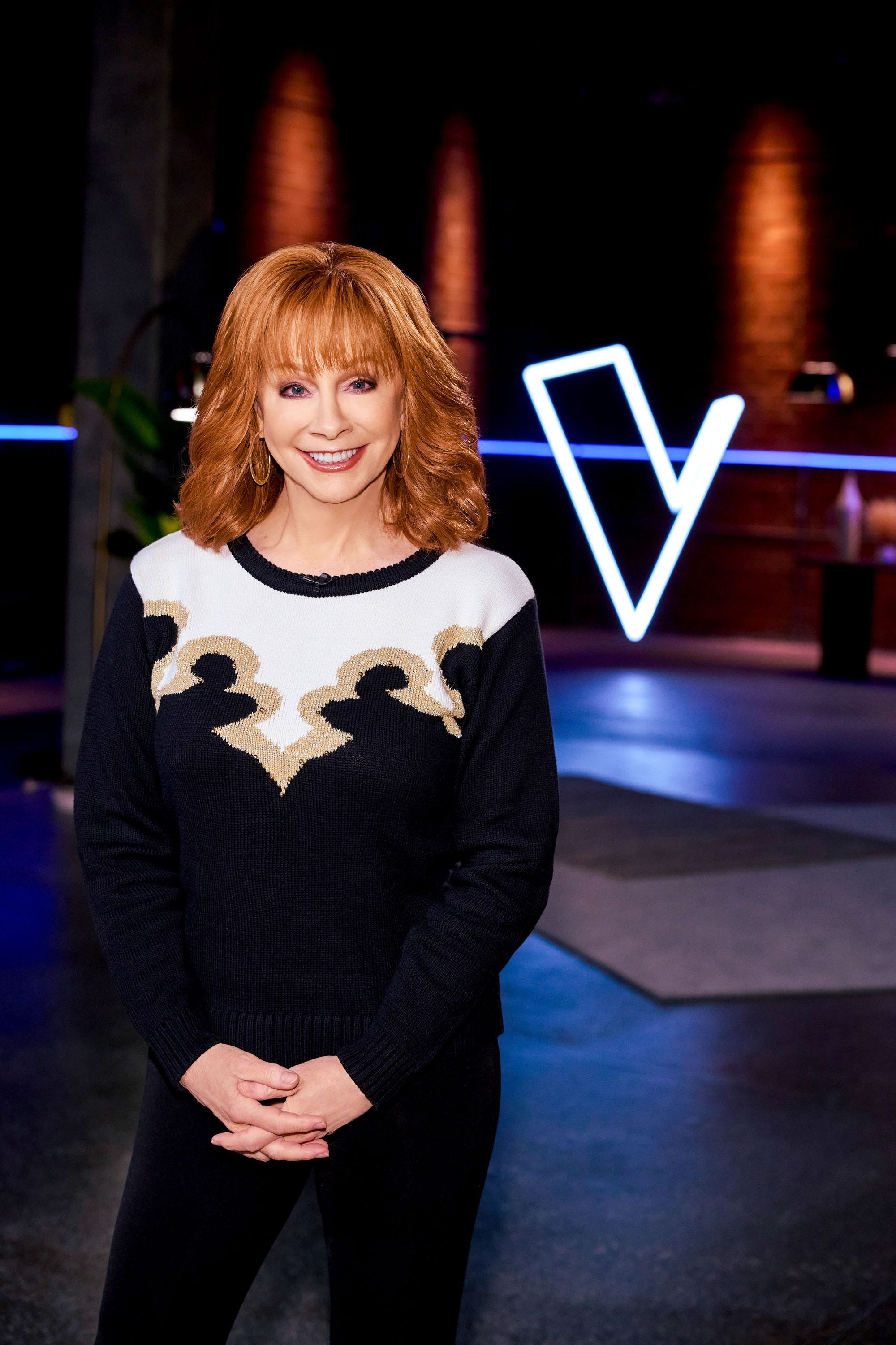 Reba McEntire coaches her team for Battles on "The Voice" Season 24.