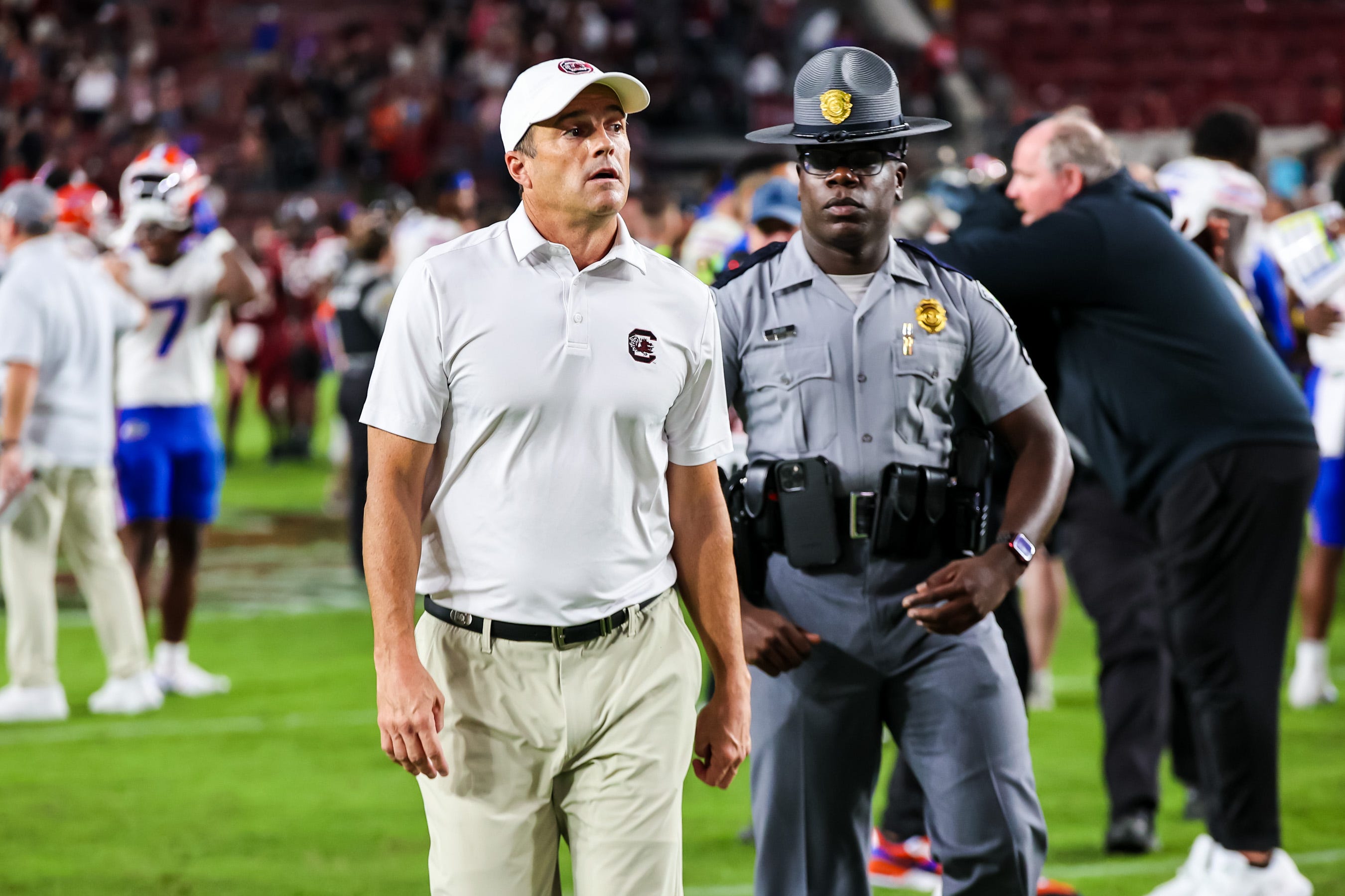 South Carolina coach Shane Beamer walks off the field after the Gamecocks' loss to Florida.