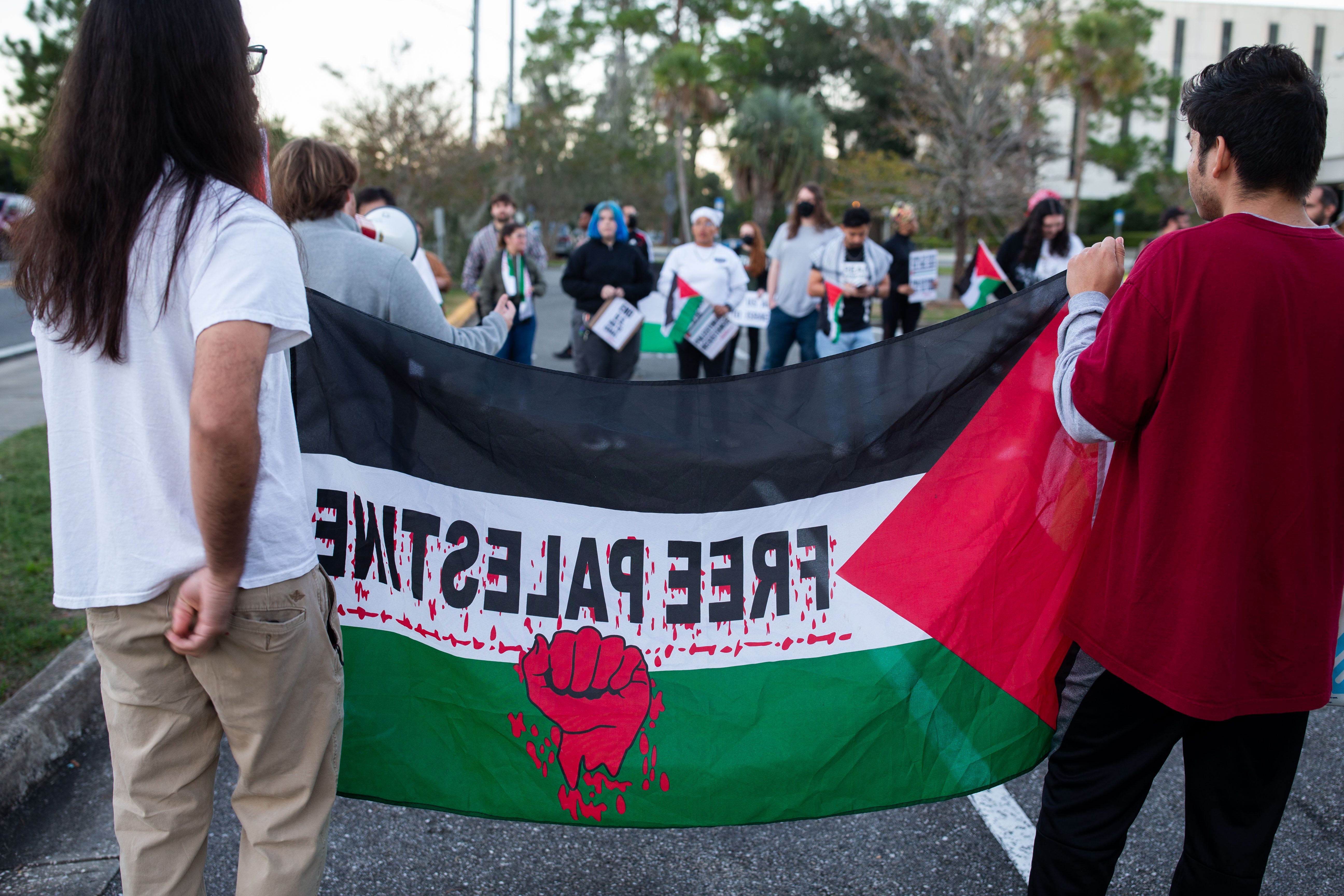 A couple hundred people gathered in a parking lot across from Cascades Park to show support for Palestine and protest aid being sent to Israel on Wednesday, Oct. 18, 2023.