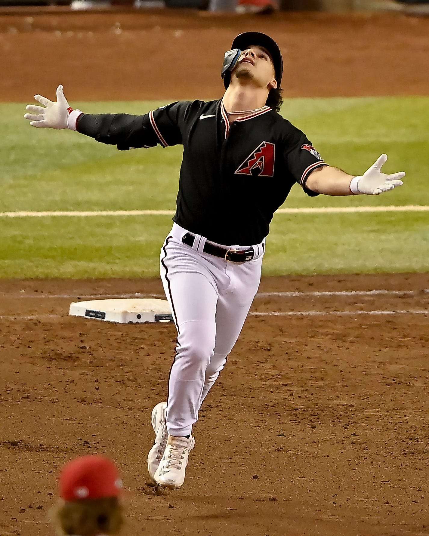 Alek Thomas of the Diamondbacks celebrates his two-run home run against the Phillies in the eighth inning.