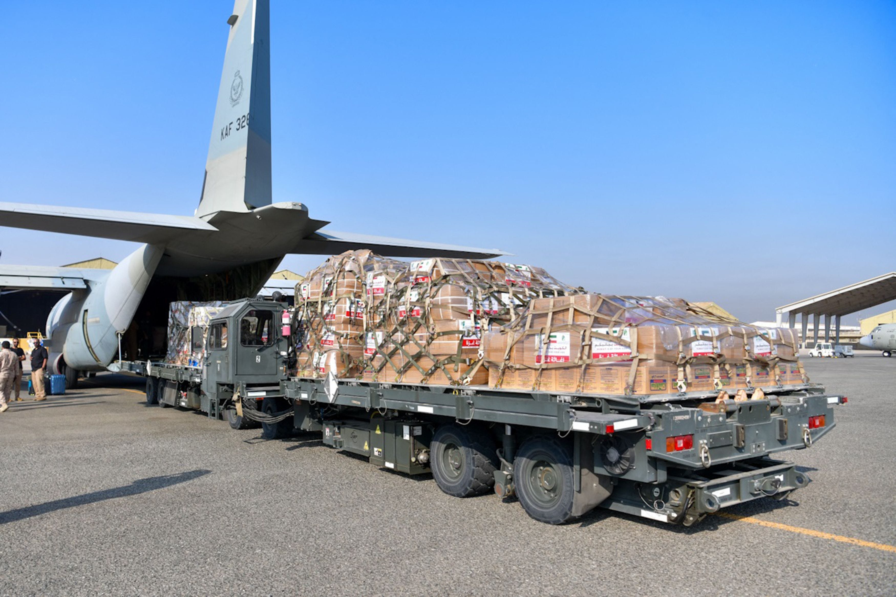A handout photo released by the Kuwaiti news agency KUNA shows humanitarian aid bound for Gaza through Egypt being loaded into a military aircraft at the International Airport in Kuwait City on Oct. 24, 2023, amid the ongoing battles between Israel and the Palestinian group Hamas. Thousands of civilians, both Palestinians and Israelis, have died since Oct. 7, 2023, after Palestinian Hamas militants based in the Gaza Strip entered southern Israel in an unprecedented   attack, triggering a war declared by Israel on Hamas with retaliatory bombings on Gaza.