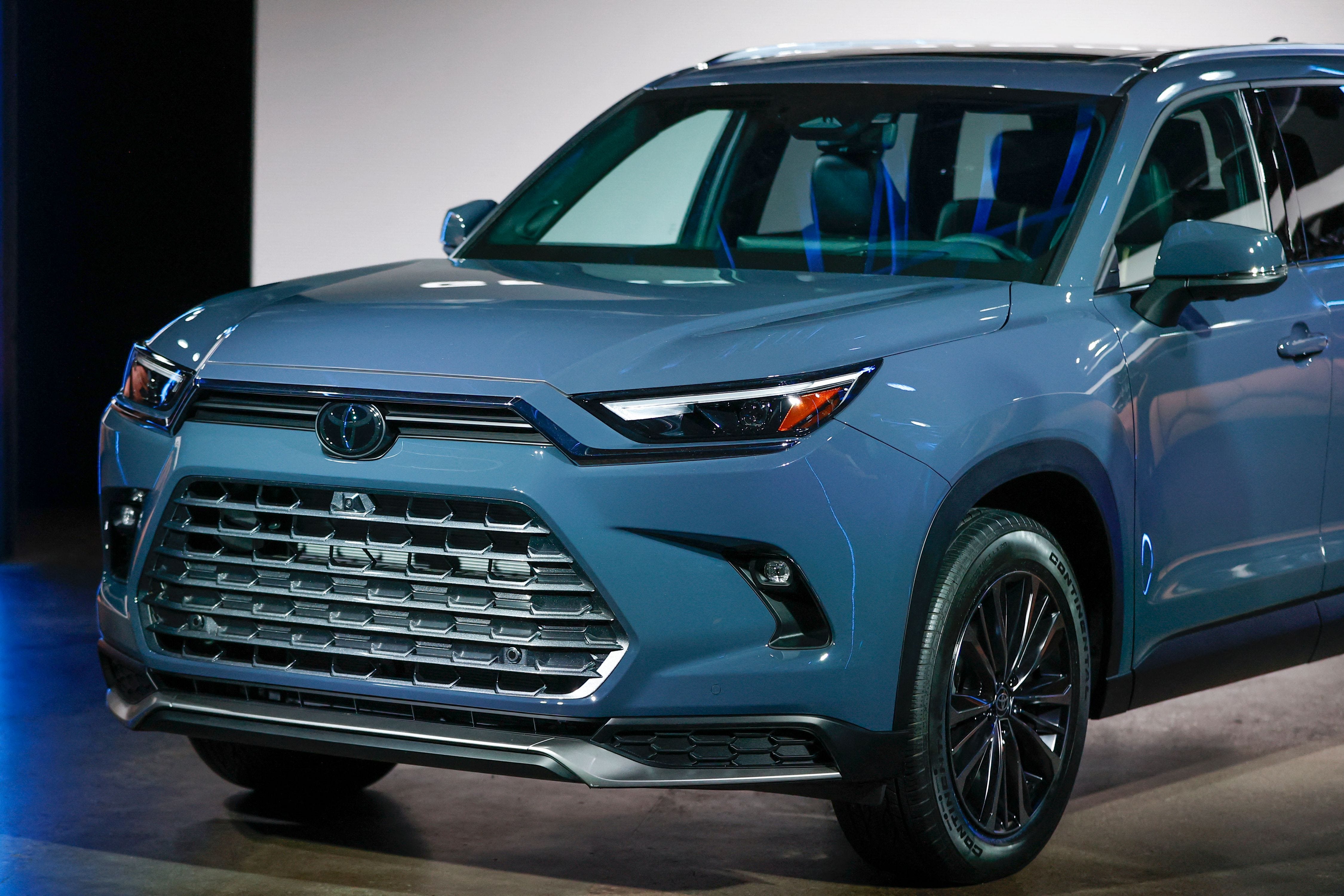 The all-new, three-row 2024 Toyota Grand Highlander is shown during world premiere event at Chicago Auto Show on February 8, 2023 in Chicago, Illinois. - Japanese automaker Toyota said Thursday, February 9, 2023, its net profit for the third quarter fell eight percent, but it left its full-year forecasts unchanged.  The world's top-selling carmarker, which reshuffled its top executive line-up last month, reported a net profit of 727.9 billion yen ($5.6 billion), down from 791.7 billion yen a year earlier. (Photo by KAMIL KRZACZYNSKI / AFP) (Photo by KAMIL KRZACZYNSKI/AFP via Getty Images)