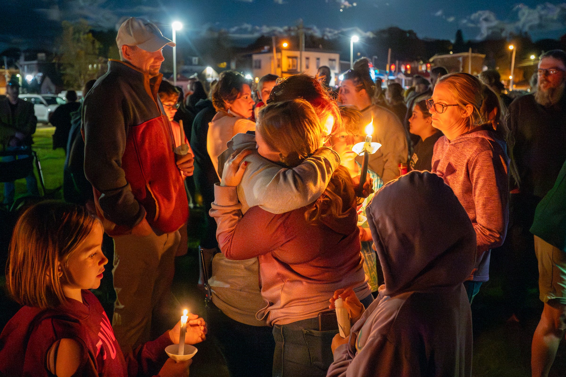 Community members gather for a vigil in Lisbon, Me. On Oct 28, 2023 to remember those killed in the mass shootings in Lewiston.