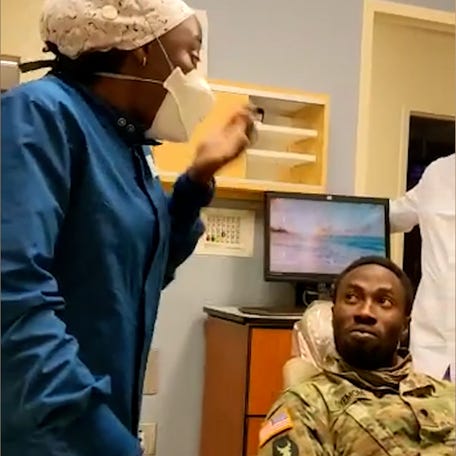 National Guard Sergeant Damilare Victor Oyemomi shocks his dental worker wife, Lizy, by posing as a patient on his secret return from deployment.