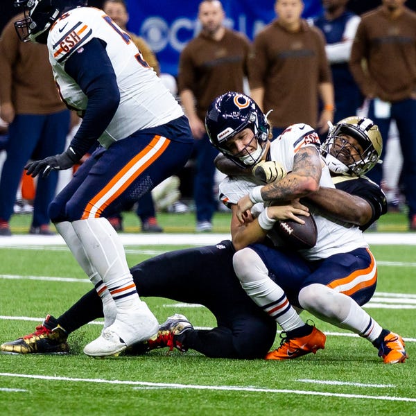 New Orleans Saints defensive end Cameron Jordan (94) sacks Chicago Bears quarterback Tyson Bagent (17) during the first half at the Caesars Superdome.