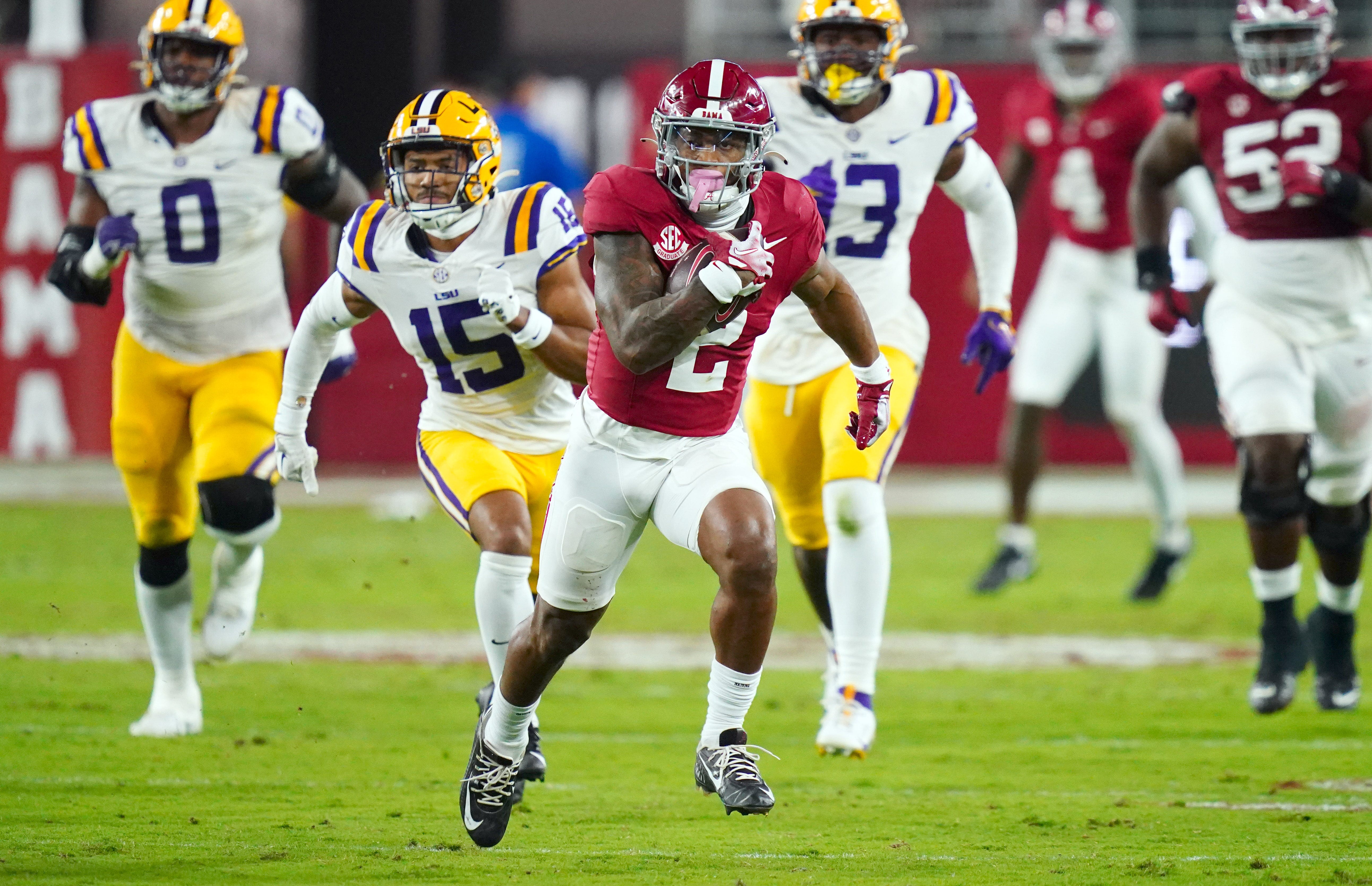 Alabama running back Jase McClellan (2) runs for yardage against LSU during the second quarter at Bryant-Denny Stadium.