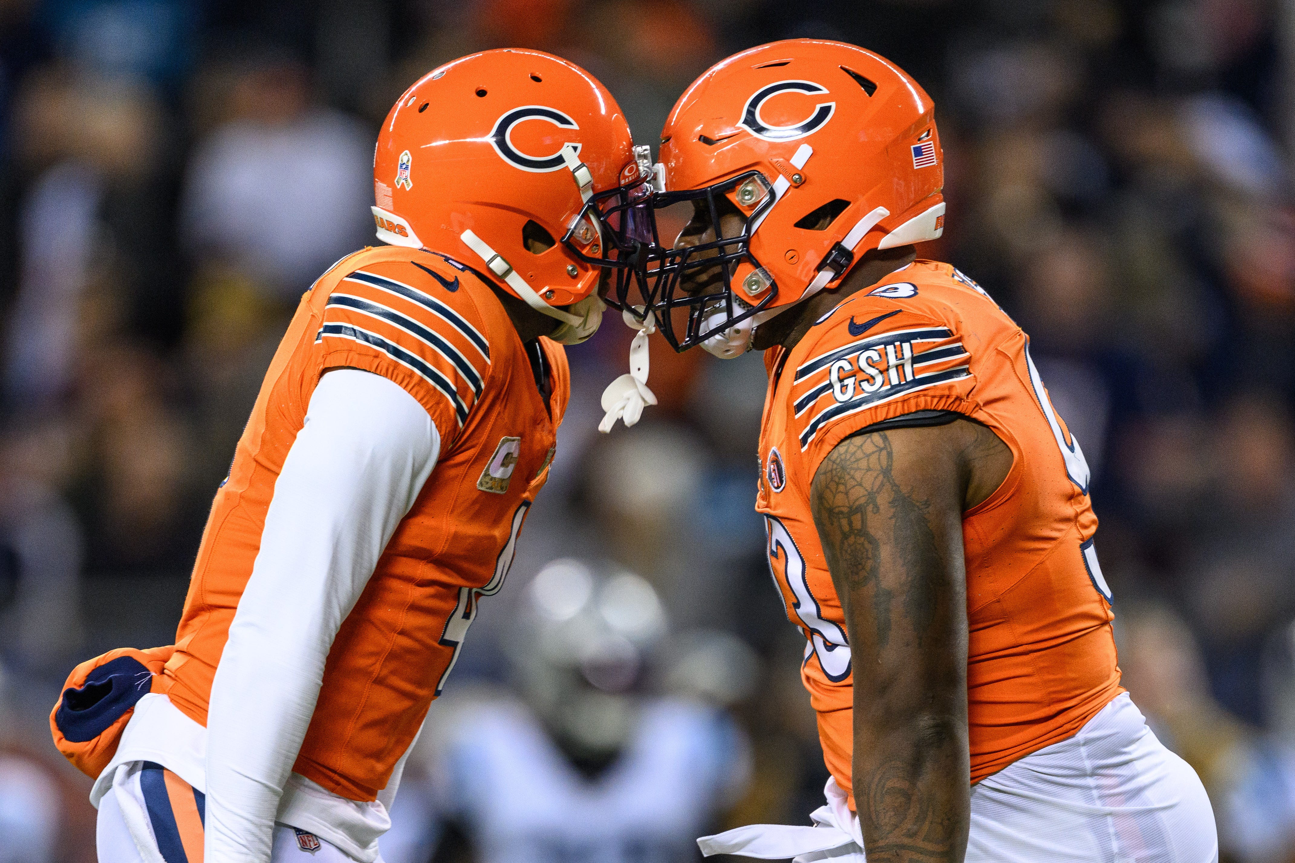 Chicago Bears defensive back Eddie Jackson (4) and defensive tackle Justin Jones (93) celebrate a sack.