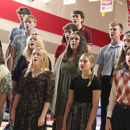 DCG Singers perform the national anthem during the Veterans Day program on Thursday, Nov. 9, 2023, at Dallas Center-Grimes High School.