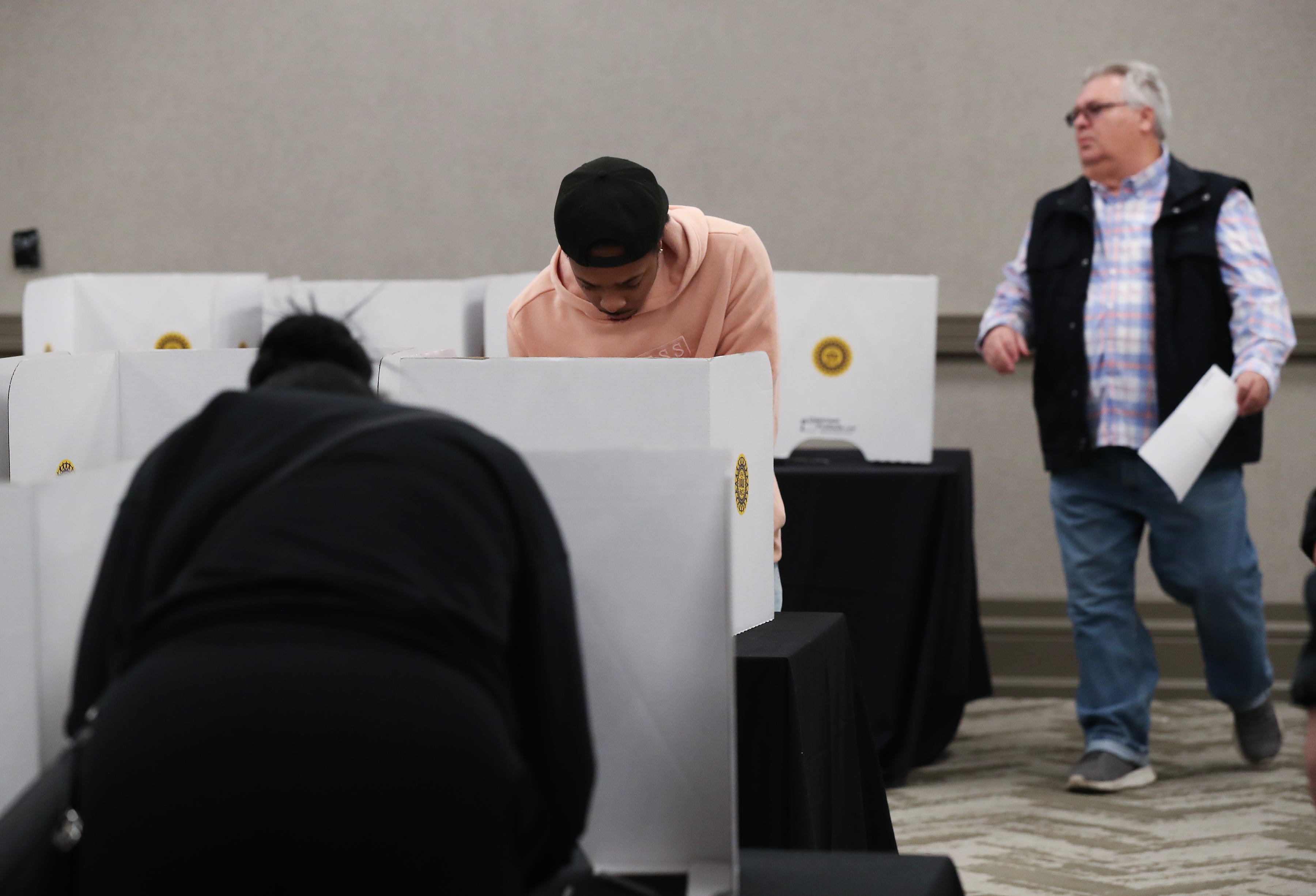 UAW Local 862 members cast their ballots on the vote to ratify a Ford contract at the Galt House in Louisville, Ky. on Nov. 12, 2023.