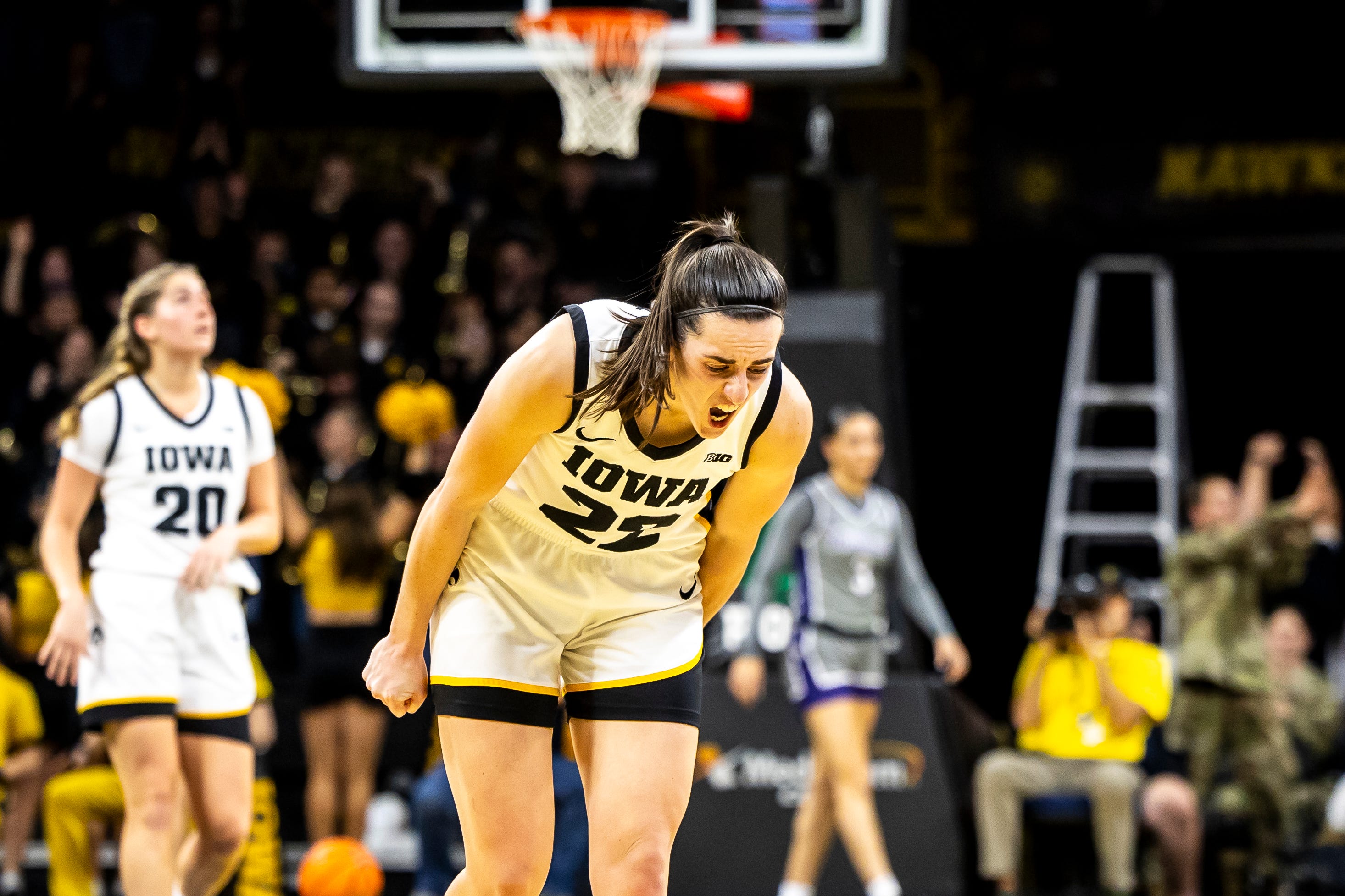 Iowa guard Caitlin Clark (22) reacts after making a 3-point basket during NCAA women's basketball game against Kansas State, Thursday, Nov. 16, 2023, at Carver-Hawkeye Arena in Iowa City, Iowa.