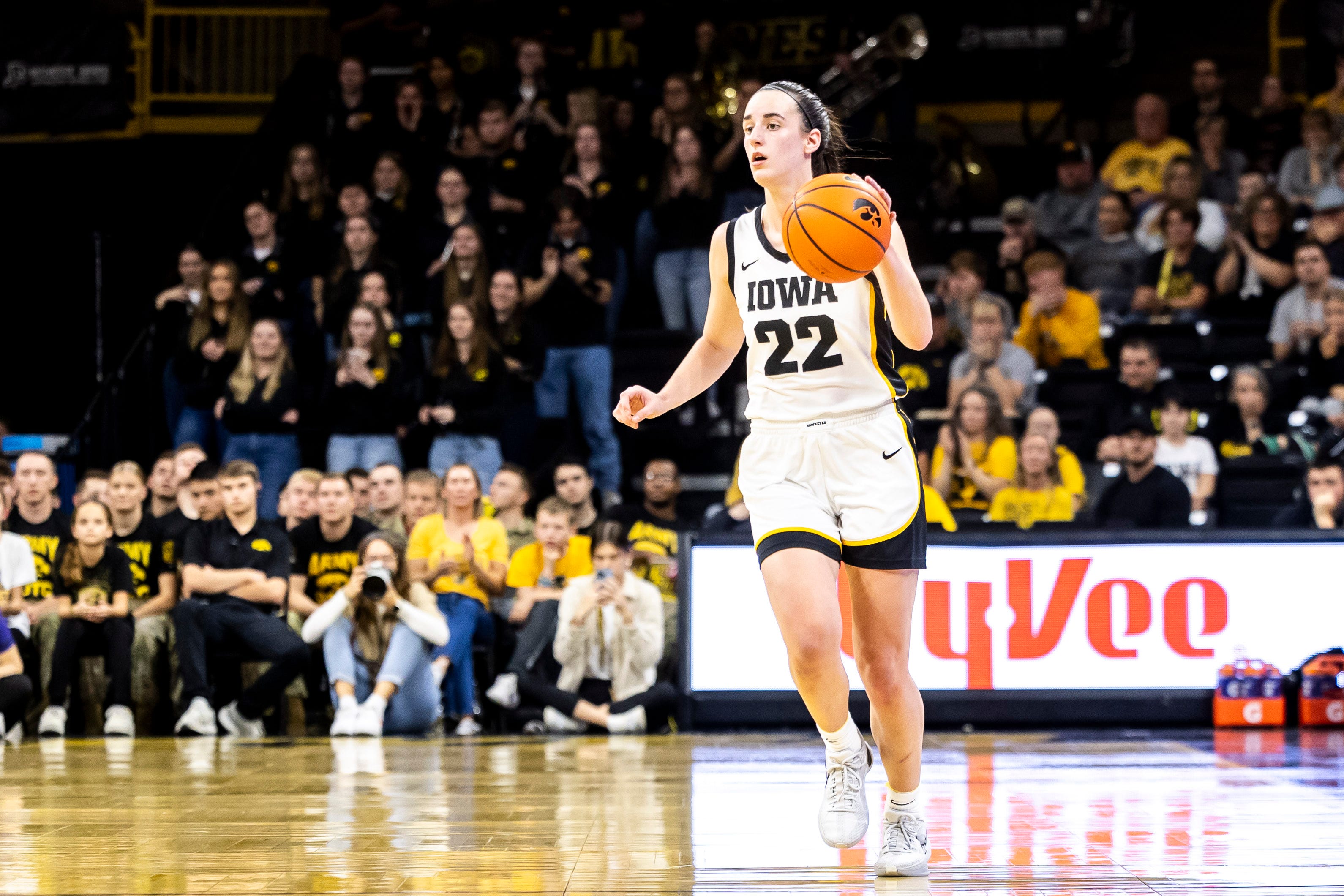 Iowa guard Caitlin Clark (22) dribbles up court during NCAA women's basketball game against Kansas State, Thursday, Nov. 16, 2023, at Carver-Hawkeye Arena in Iowa City, Iowa.