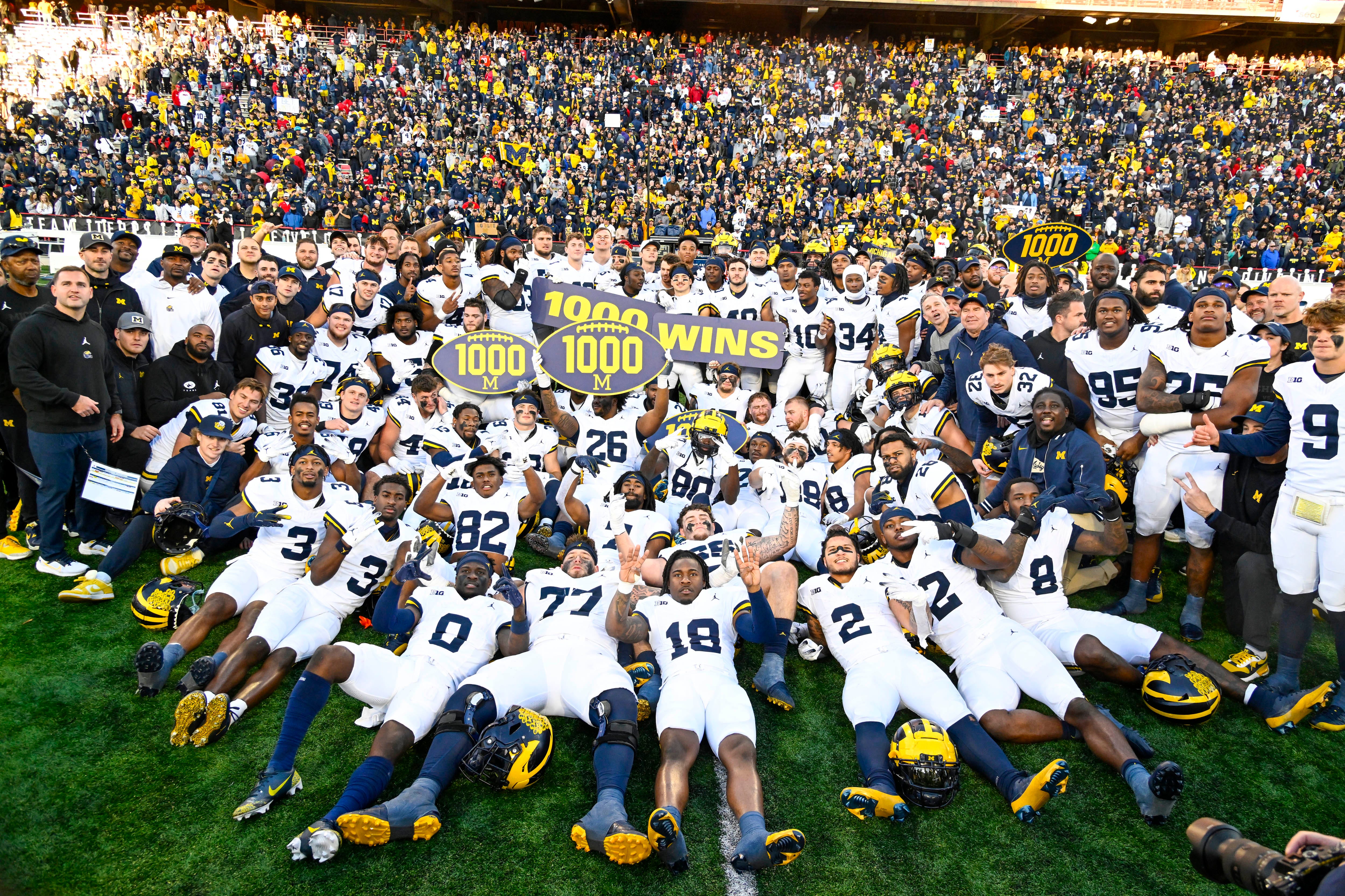 Michigan Wolverines celebrate the 1000th win in program history after the game against the Maryland Terrapins.