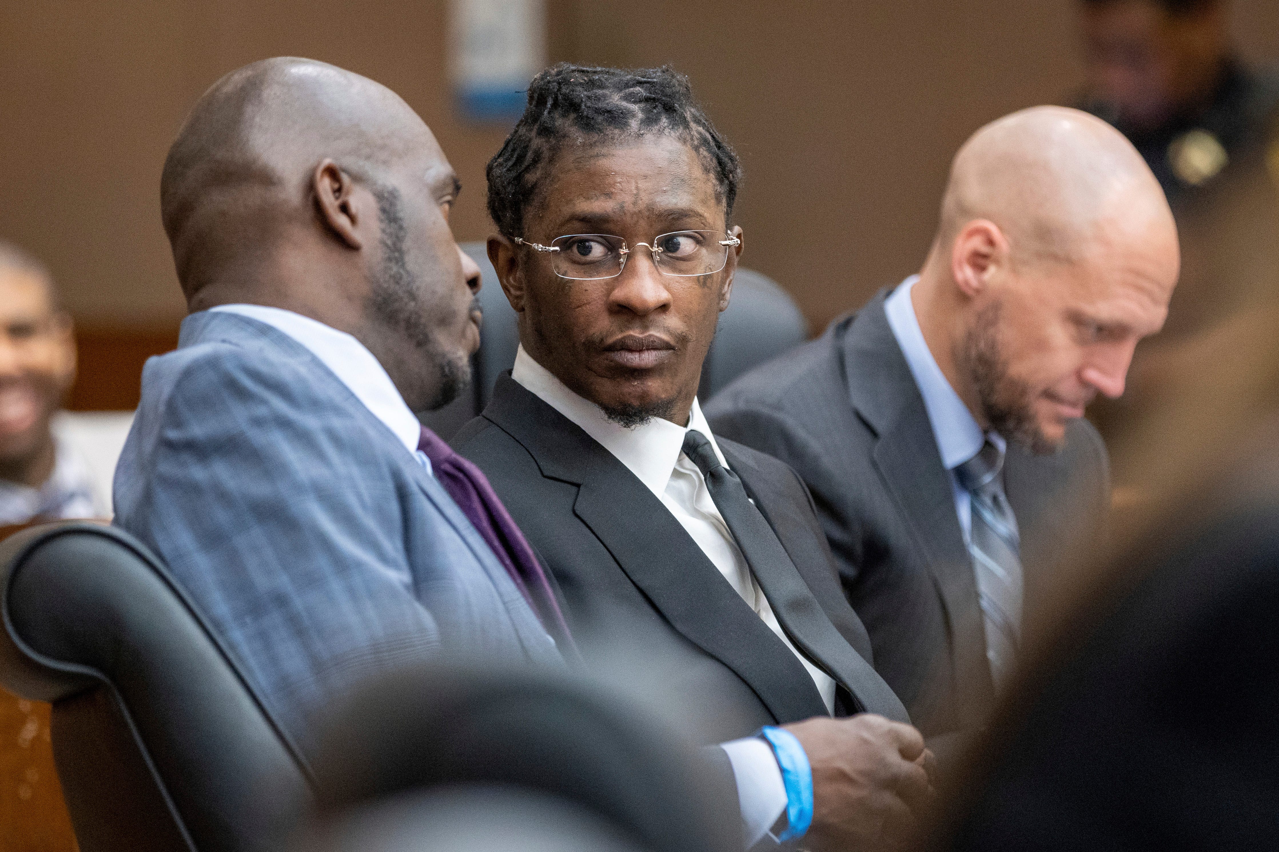 FILE - Young Thug attends a hearing on the YSL case in Atlanta on Dec. 22, 2022. Nearly 10 months after jury selection began, a panel of Georgia citizens was selected Wednesday, Nov. 1, 2023, for the trial of rapper Young Thug and several other people accused of participating in a criminal street gang responsible for violent crimes. (Arvin Temkar/Atlanta Journal-Constitution via AP, File) ORG XMIT: GAATJ751