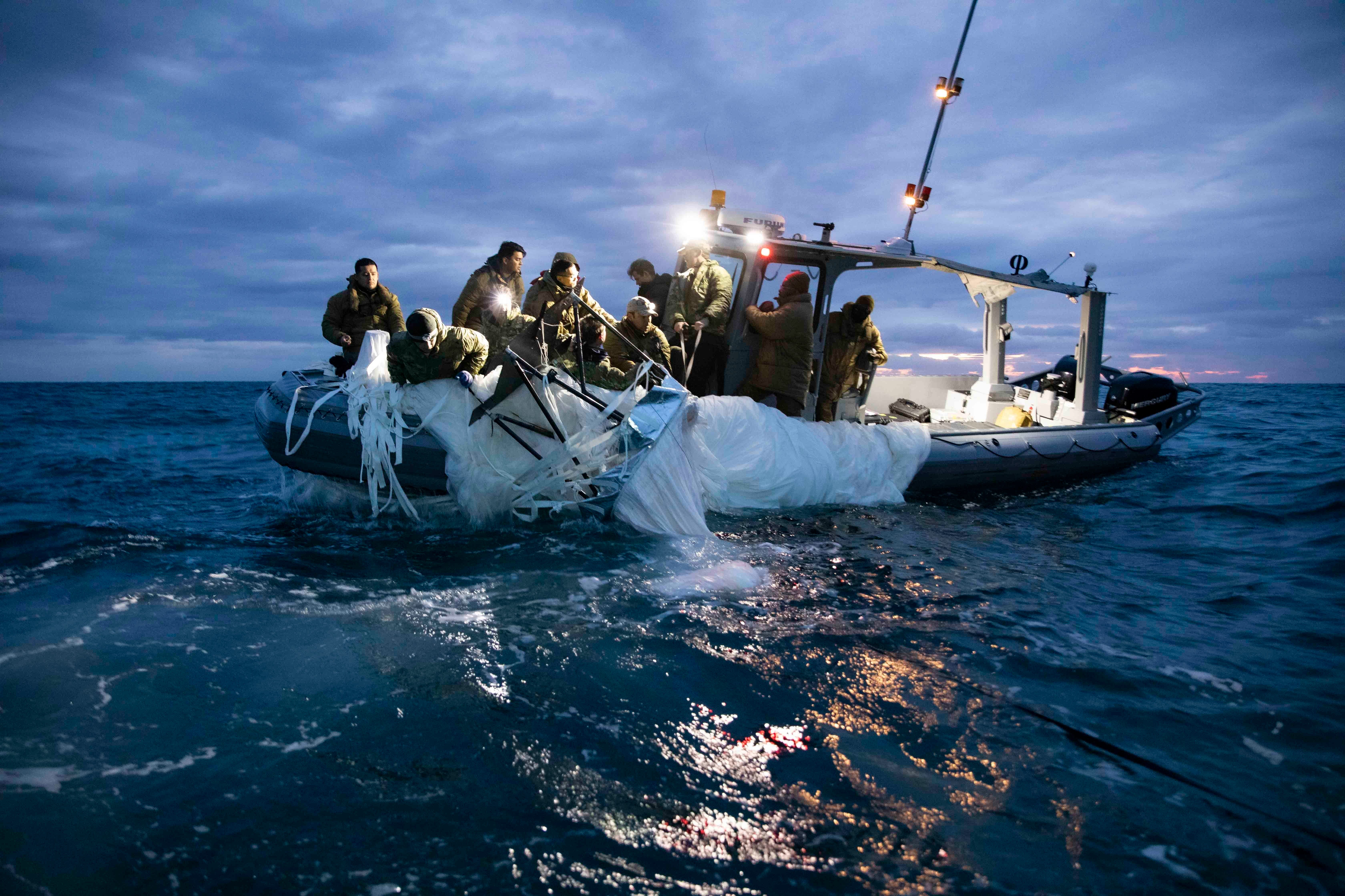 U.S. Navy sailors recover a high-altitude surveillance balloon off the coast of Myrtle Beach, South Carolina, on Feb. 5, 2023.