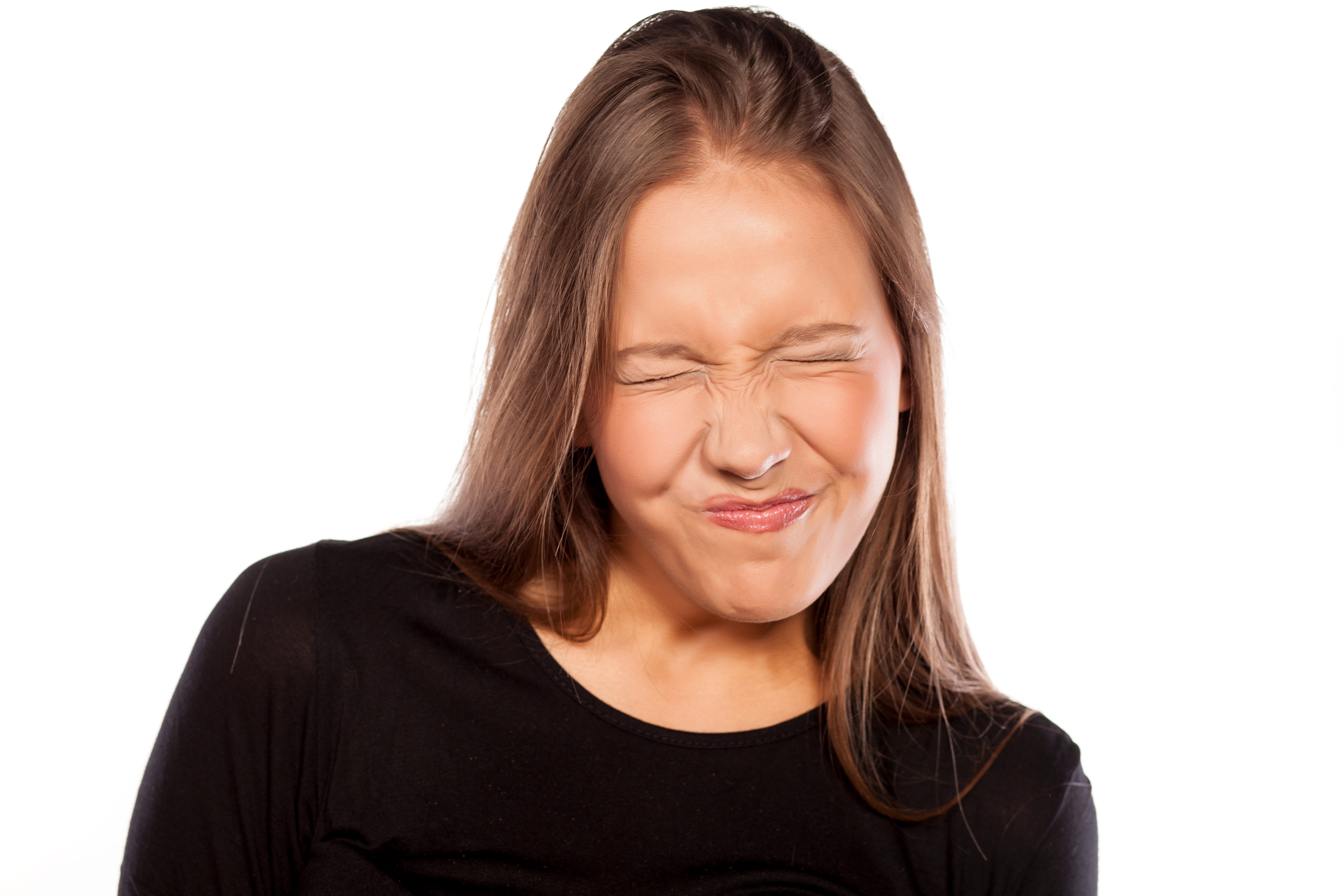 young woman with sour gesture