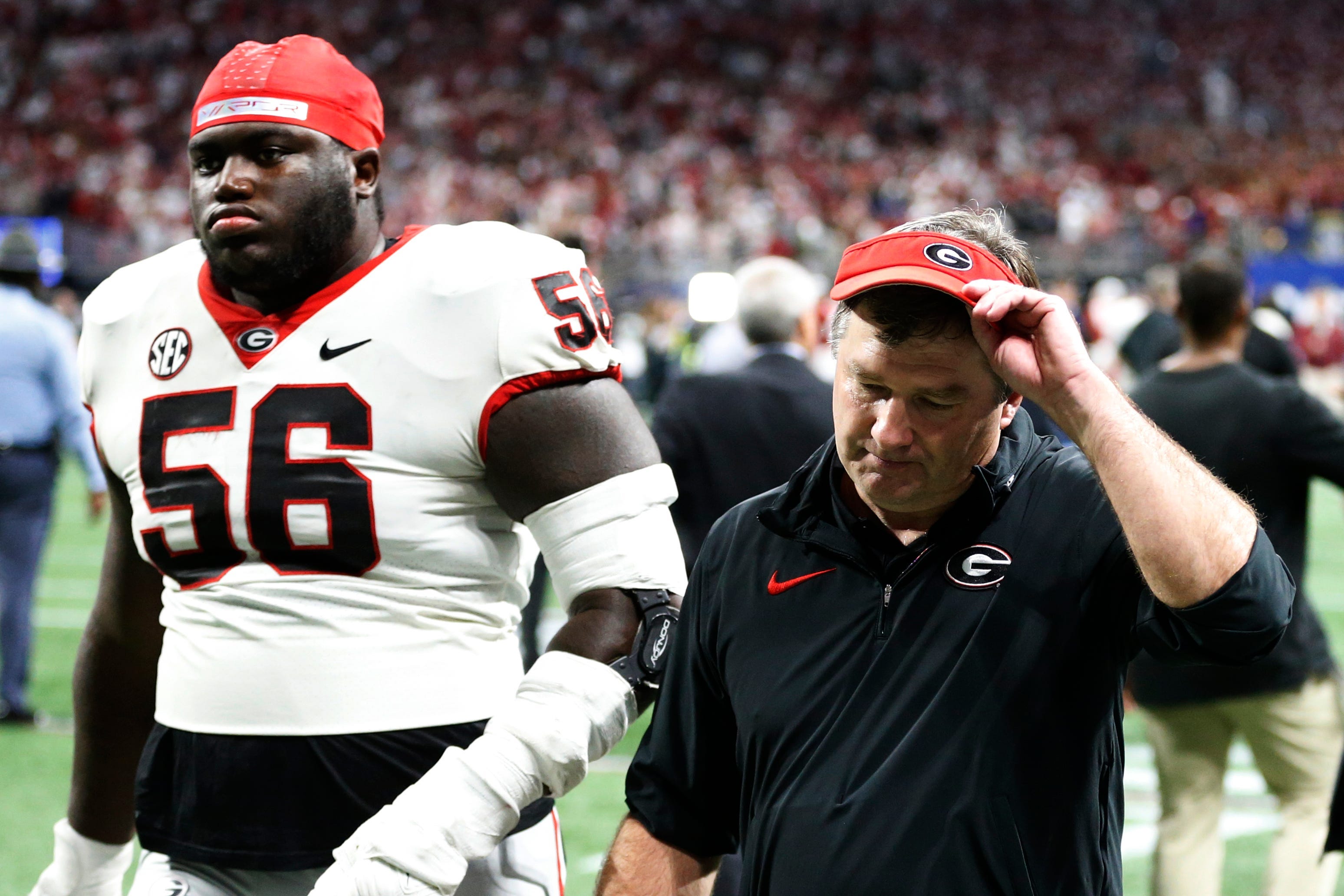 Georgia coach Kirby Smart walks off the field after the Bulldogs lost the SEC championship game.