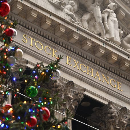 A Christmas tree stands in front of the New York Stock Exchange (NYSE) in New York on December 1, 2023.