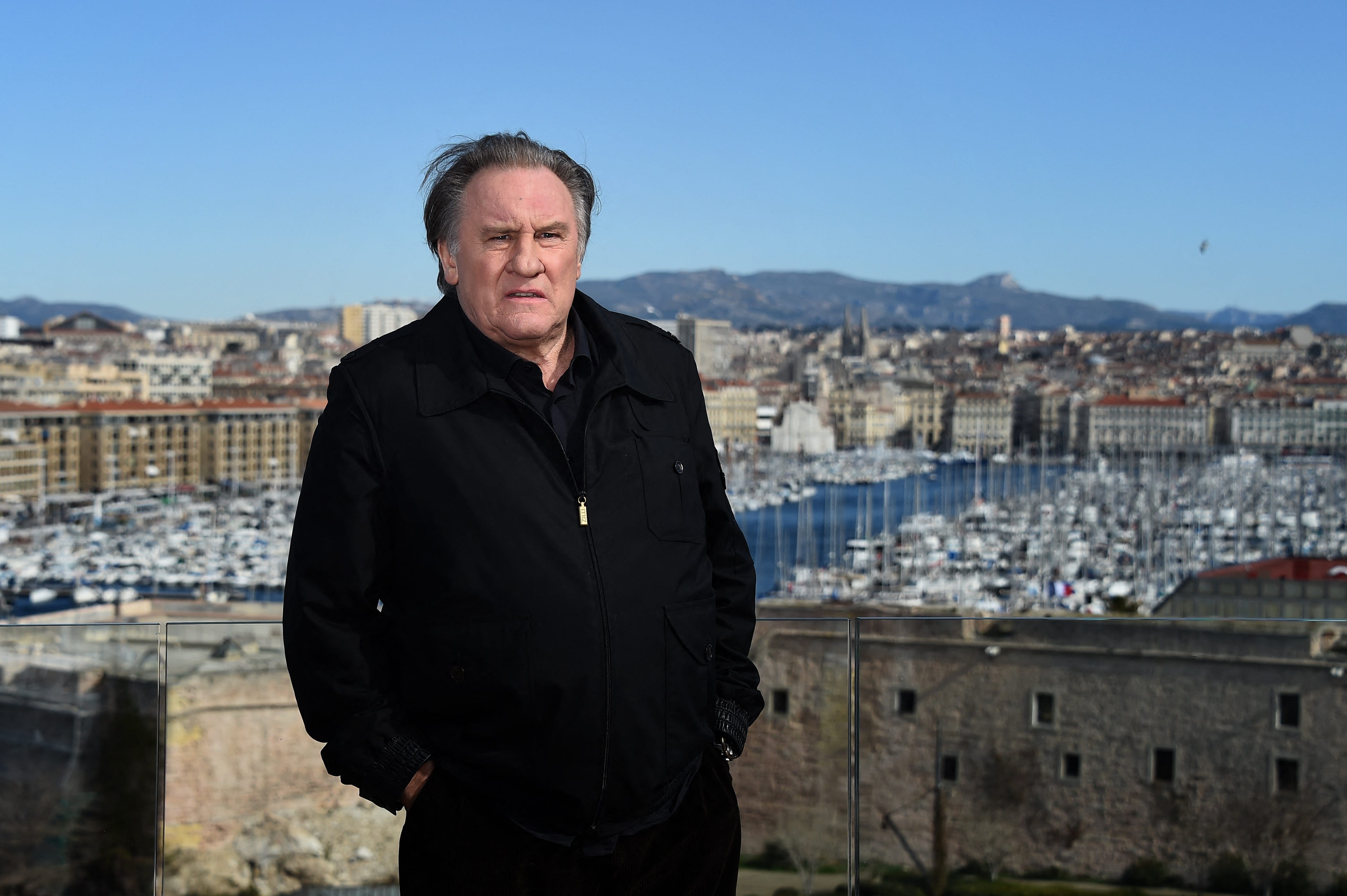(FILES) French actor Gerard Depardieu poses during a photocall for the second season of the French TV show "Marseille" broadcasted and co-produced by US streaming video giant Netflix, on February 18, 2018 in Marseille, southern France. A fellow actor filed a sexual assault complaint against Gerard Depardieu in September, prosecutors said on December 6, 2023, adding to a string of allegations targeting the French star. (Photo by ANNE-CHRISTINE POUJOULAT /   AFP) (Photo by ANNE-CHRISTINE POUJOULAT/AFP via Getty Images) ORIG FILE ID: 1832314904