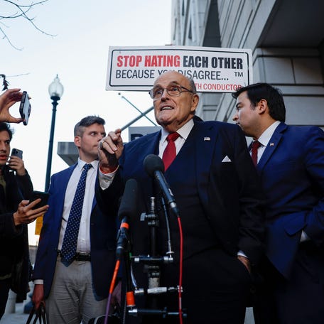 Rudy Giuliani, the former personal lawyer for former President Donald Trump, speaks with reporters outside of the E. Barrett Prettyman U.S. District Courthouse after a verdict was reached in his defamation jury trial on Dec. 15, 2023 in Washington, DC. A jury has ordered Giuliani to pay $148 million in damages to Fulton County election workers Ruby Freeman and Shaye Moss.
