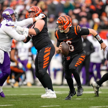 Cincinnati Bengals quarterback Jake Browning (6) scrambles in the second quarter of the NFL Week 15 game between the Cincinnati Bengals and the Minnesota Vikings at PayCor Stadium in downtown Cincinnati on Saturday, Dec. 16, 2023.