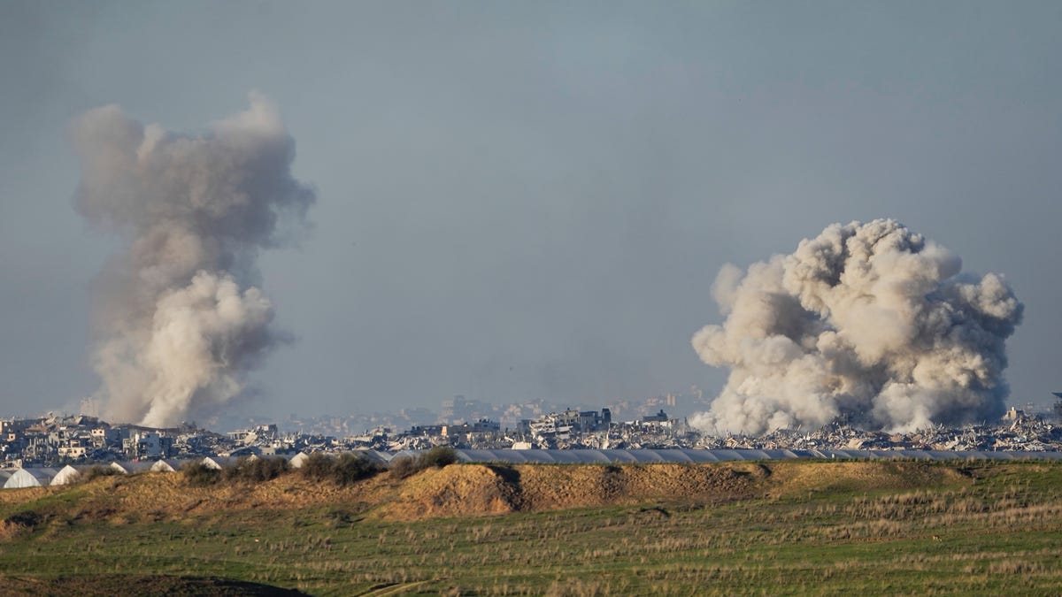 Smoke rises following an Israeli bombardment in the Gaza Strip, as seen from southern Israel, Saturday, Dec. 16, 2023. (AP Photo/Ariel Schalit) ORG XMIT: XOB111