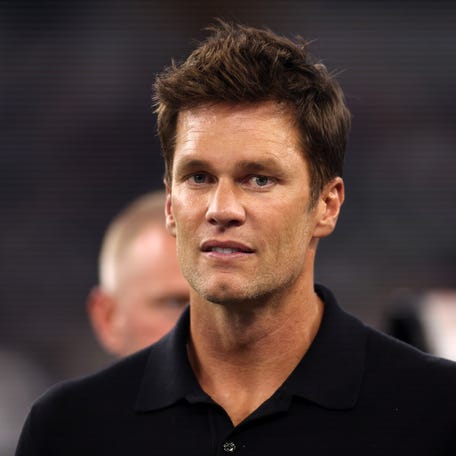 Aug 26, 2023; Arlington, Texas, USA; Former NFL player Tom Brady on the field before the game between the Dallas Cowboys and the Las Vegas Raiders at AT&T Stadium. Mandatory Credit: Tim Heitman-USA TODAY Sports