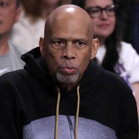 Kareem Abdul-Jabbar watches an NBA playoff game between the Los Angeles Lakers and the Golden State Warriors on May 8, 2023.