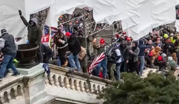 Image of Barbara Balmaseda, 23, of Miami Lakes, Fla. included in a Department of Justice court document with evidence for her arrest on felony and misdemeanor charges related to her role in the riot at the U.S. Capitol on January 6, 2021. Balmaseda can be seen wearing a black coat with a shearling lining, as in other photos included in the allegations.