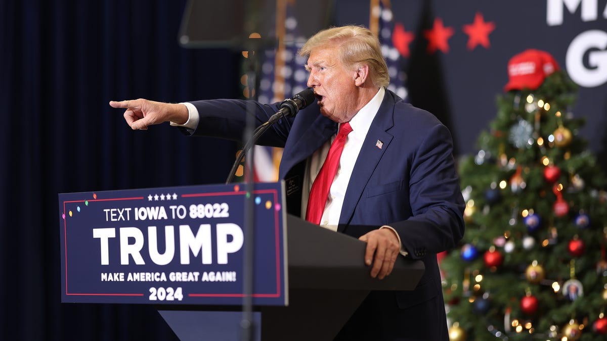 Republican presidential candidate and former U.S. President Donald Trump speaks at a campaign event on December 19, 2023 in Waterloo, Iowa.
