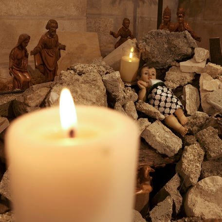 A nativity scene portraying baby Jesus lying in his manger amid rubble at a Lutheran church in Bethlehem, West Bank, on Dec. 6, 2023. Citing the devastating war in Gaza, local leaders canceled public Christmas celebrations this year.